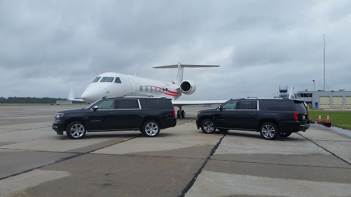 2017 Chevrolet Suburban Premier, 2016 Chevrolet Suburban LTZ and private jet at Atlantic Aviation at Newport News airport